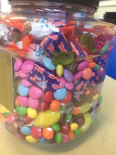 Online charity fundraising idea: Raise money to help animals by running an online “Guess How Many Sweets Are In The Jar” competition